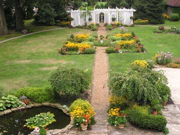 Mid August view of center gardens and pond